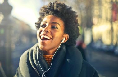 Happy smiling woman with headphones on